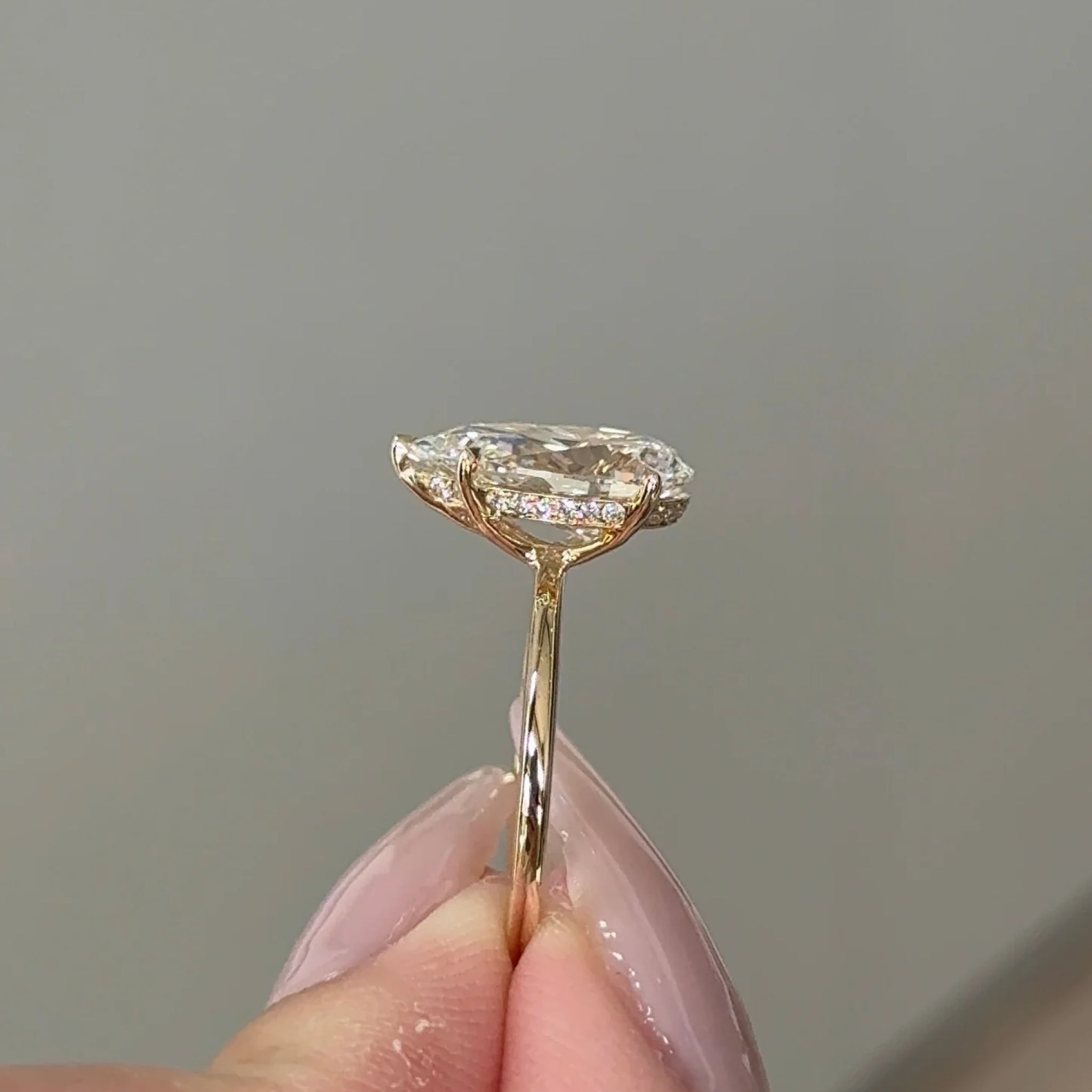 2 Carats Pear Cut Diamond Solitaire with Hidden Halo Setting