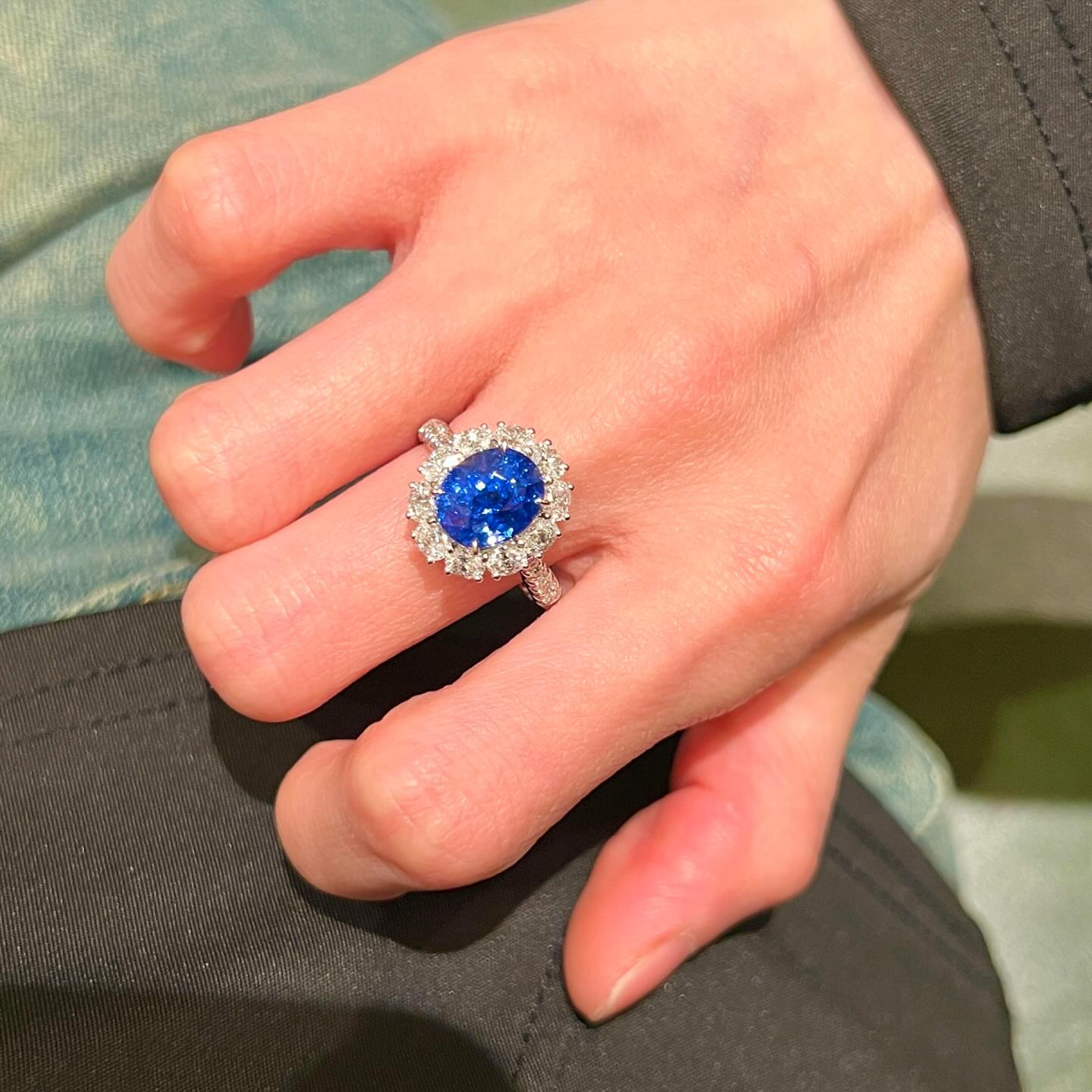 Oval Blue Sapphire & Diamond Halo Ring | Twisted Band Engagement Ring
