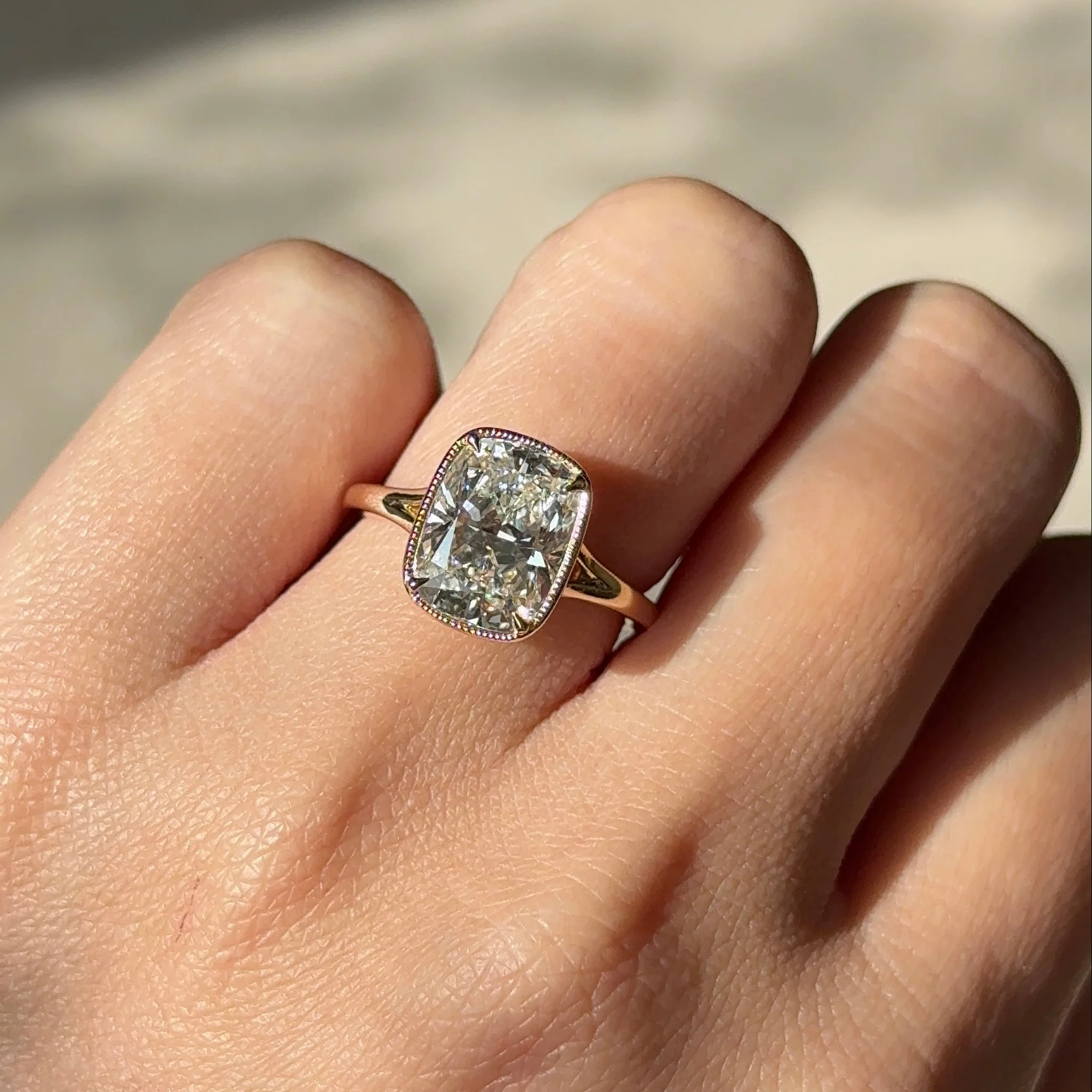 3 carats Elongated Cushion cut Tapered band with slim bezel ring