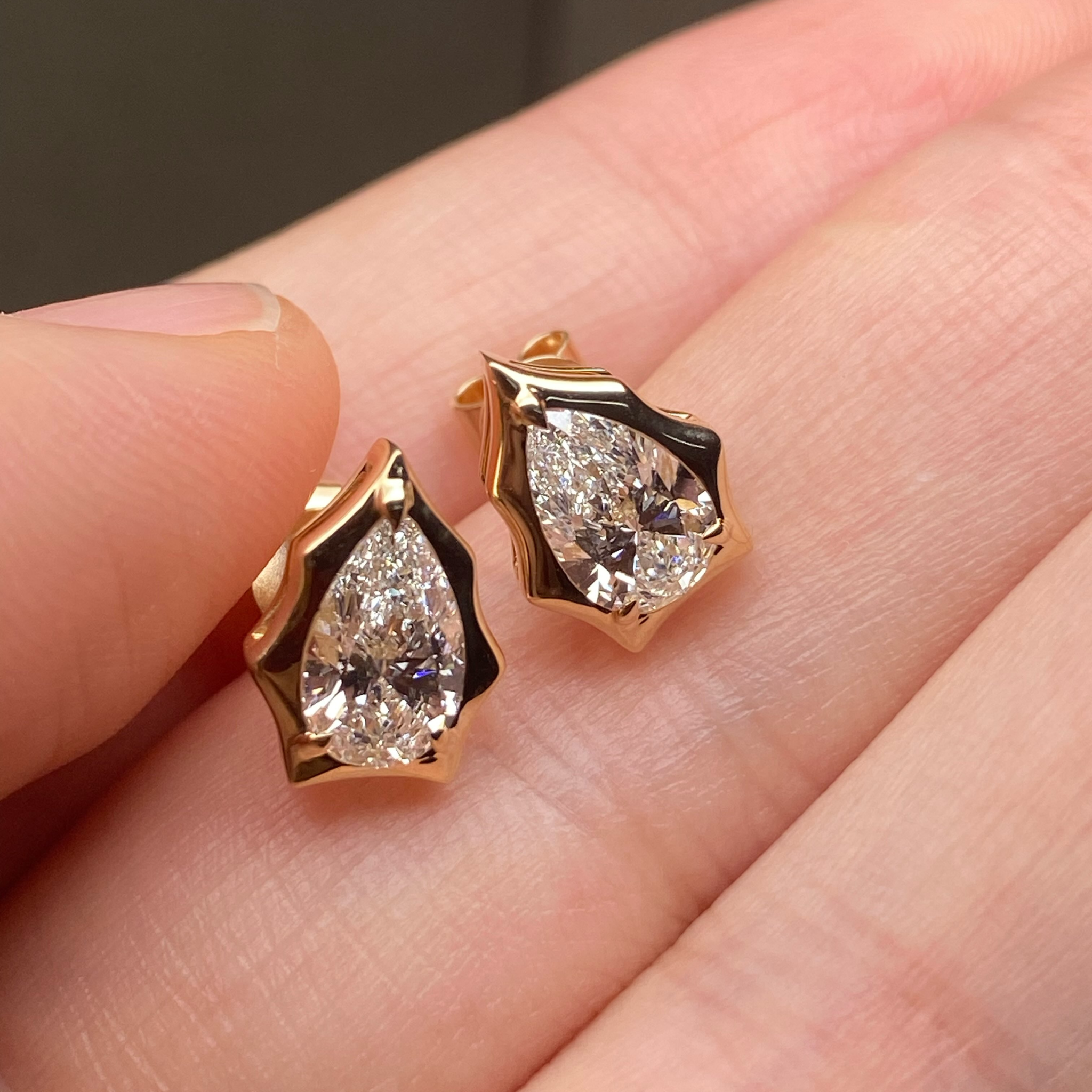 0.70CT Pear Cut Diamond Stud Earrings , Abstract Sculptural Bezel Setting