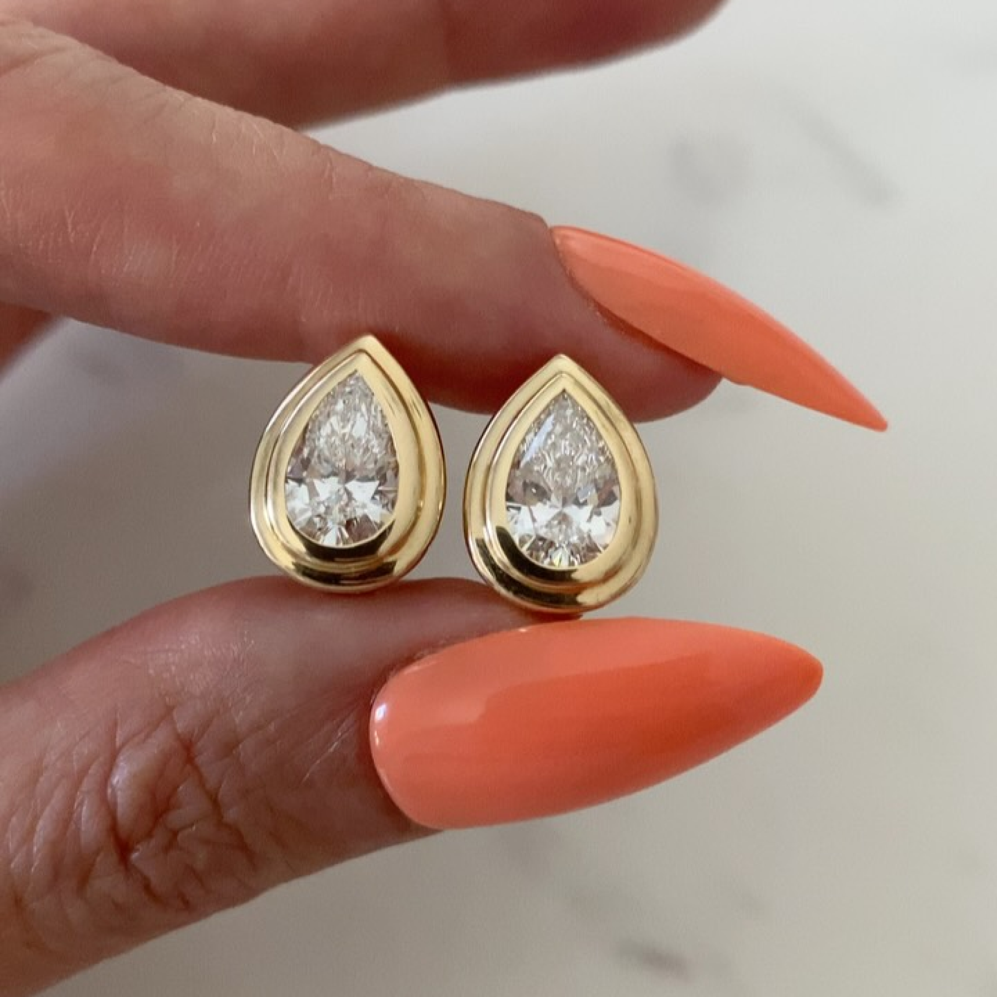 Pear-Shaped Lab Grown Diamond Stud Earrings with Double Bezel Setting