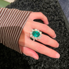 Oval Emerald & Diamond Halo Cocktail Ring | Luxury Emerald Statement Ring