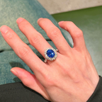 Oval Blue Sapphire & Diamond Halo Ring | Twisted Band Engagement Ring