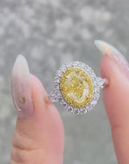 Fancy Yellow Oval Diamond Double Halo Ring | Trillion Side Stone Engagement Ring